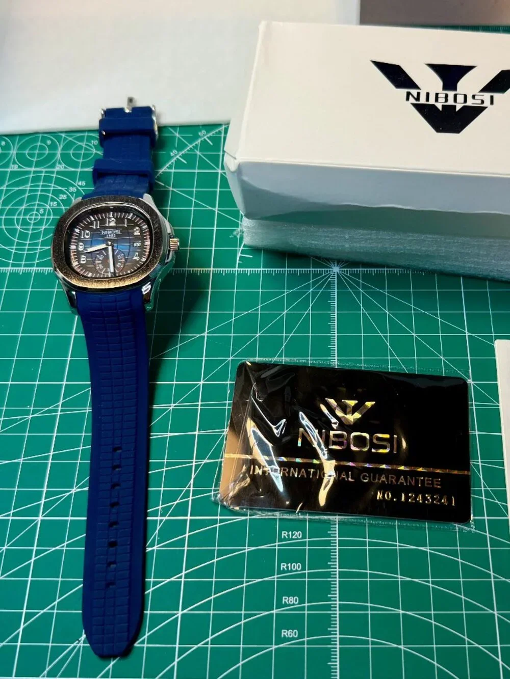 Nibosi Blue face stanless watch silicone band quarts 3Bar